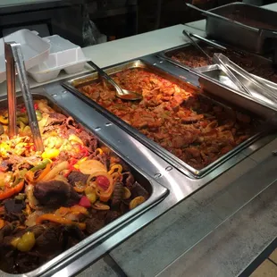 a buffet with a variety of food items