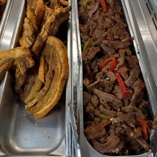 Fresh from the kitchen! Stop by today and have a taste of our delicious hot food!