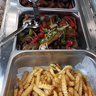 Fresh from the kitchen! Stop by today and have a taste of our delicious hot food!