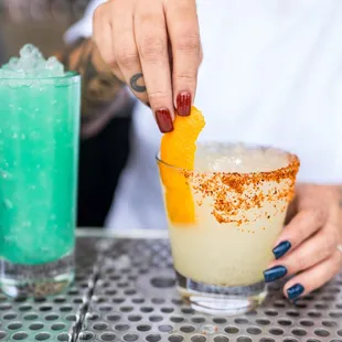 a bartender mixing a drink