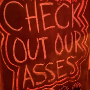 a check out our glasses sign