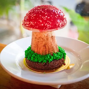 a mushroom on top of a cake