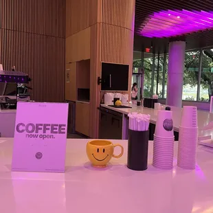 a cup of coffee on a counter