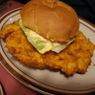 a fried chicken sandwich on a bun