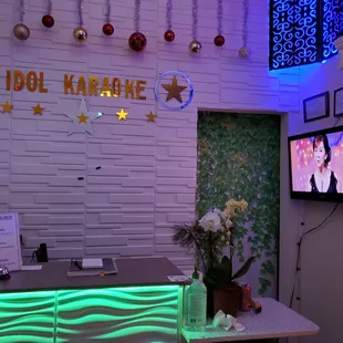the front desk of a karaoke lounge
