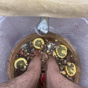 Relaxing herbal foot bath to soak your tired feet while using their massage chairs