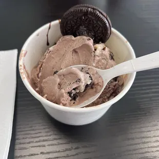 Cookies and Cream with a chocolate base and chocolate syrup drizzle