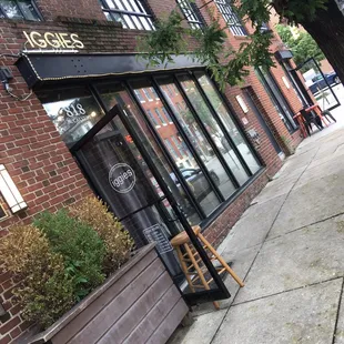 the entrance to a coffee shop