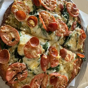 Alice pizza with pepperoni on gluten free crust