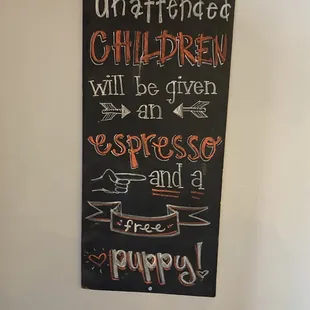 a sign on the wall of a restaurant