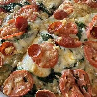 Alice pizza with pepperoni on gluten free crust