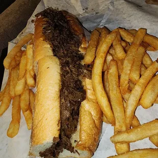 Regular classic philly double meat, white American cheese. Side of fries (this was only small portion of the order of fries)