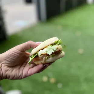 Iggycado: jammy egg, avocado, baby Swiss, marinated tomato, arugula, and iggy sauce on an English muffin