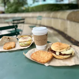 two sandwiches and a cup of coffee