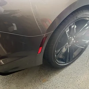 Scratched rear fender by reflector