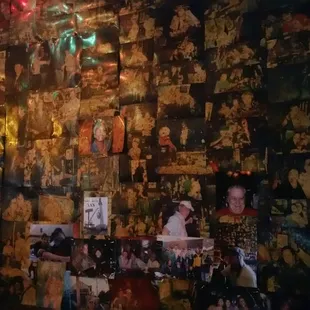 a wall full of photos and pictures