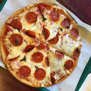 Gluten free pepperoni pizza- awesome. 5min wait time. Not by slice, pie only. $14 for the pie for two. :)