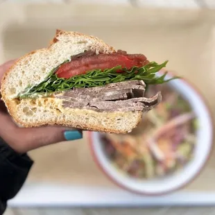 Cold Cut Beef Tongue Sandwich w/ balsamic reduced onion, arugula, tomatoes, garlic+sriarcha aioli, rize up seeded hoagie | $18 + $6 slaw