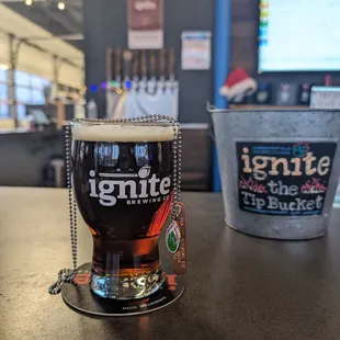 a glass of beer on a table