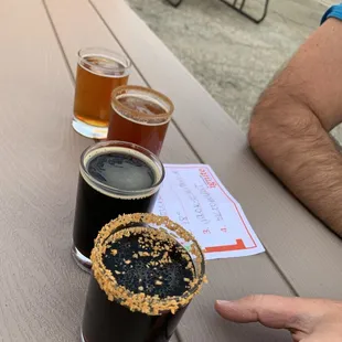 a table with four different beers