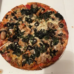 Mushrooms, spinach, black olives, and sausage