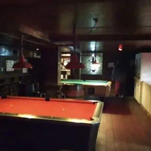 Billiard tables and Washers and Dryers in the right corner.