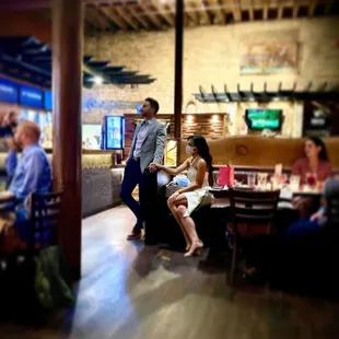 a man and a woman sitting at a table