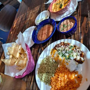 Enchiladas red and green rice queso beans chips n salsa