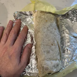 a burrito wrapped in foil