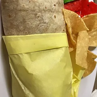 Al pastor Burrito Thursday.. eaten there served with chips