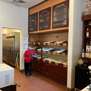 a woman standing in a kitchen