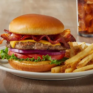 a hamburger and fries on a plate