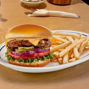 a hamburger and french fries on a plate
