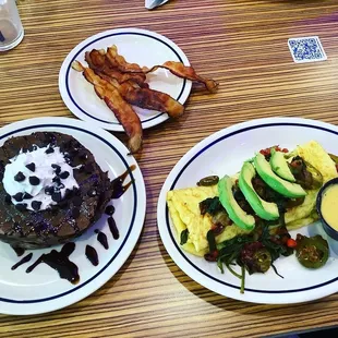 Double chocolate chip pancakes and veggie omelette.