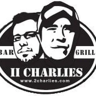 a black and white image of two men