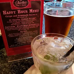a happy hour menu and a drink