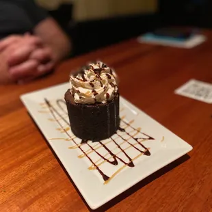 a piece of chocolate cake on a plate