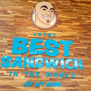 the sign for the best sandwich in the world by my mom