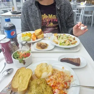 Salmon, salads, meatballs, garlic bread, and The Love of My Life