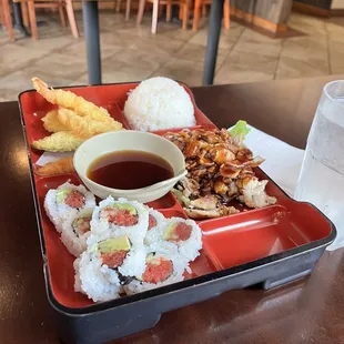 Bento (Choice of 3) with teriyaki chicken, mixed tempura and spicy tuna roll.