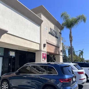 Located behind the Starbucks drive thru