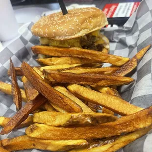 Double cheeseburger with mustard, chili, &amp; onions with home fries!