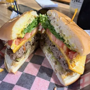 A darn good burger!! A cheddar cheese burger with All the trimmings!