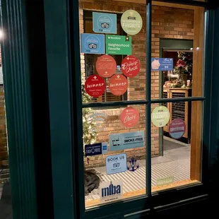 a store window with stickers on it