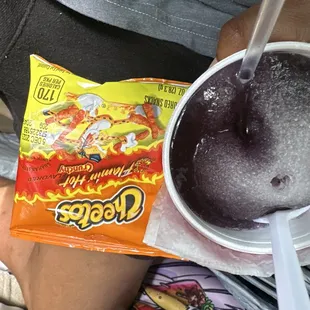 a bowl of ice cream and a bag of candy