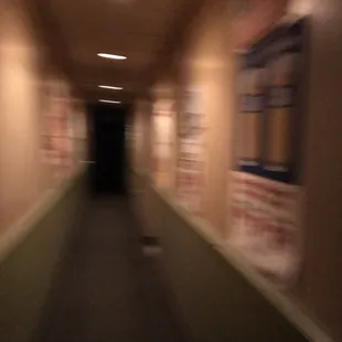 There&apos;s a couple of restrooms down this well lit hallway