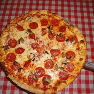 a pepperoni and mushroom pizza