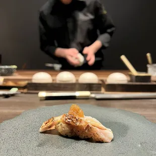 a chef preparing a dish