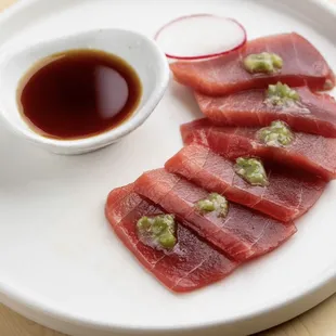 Maguro Wasabi: tuna sashimi, fresh chopped pickled wasabi, special soy sauce.