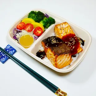 a bento box of food